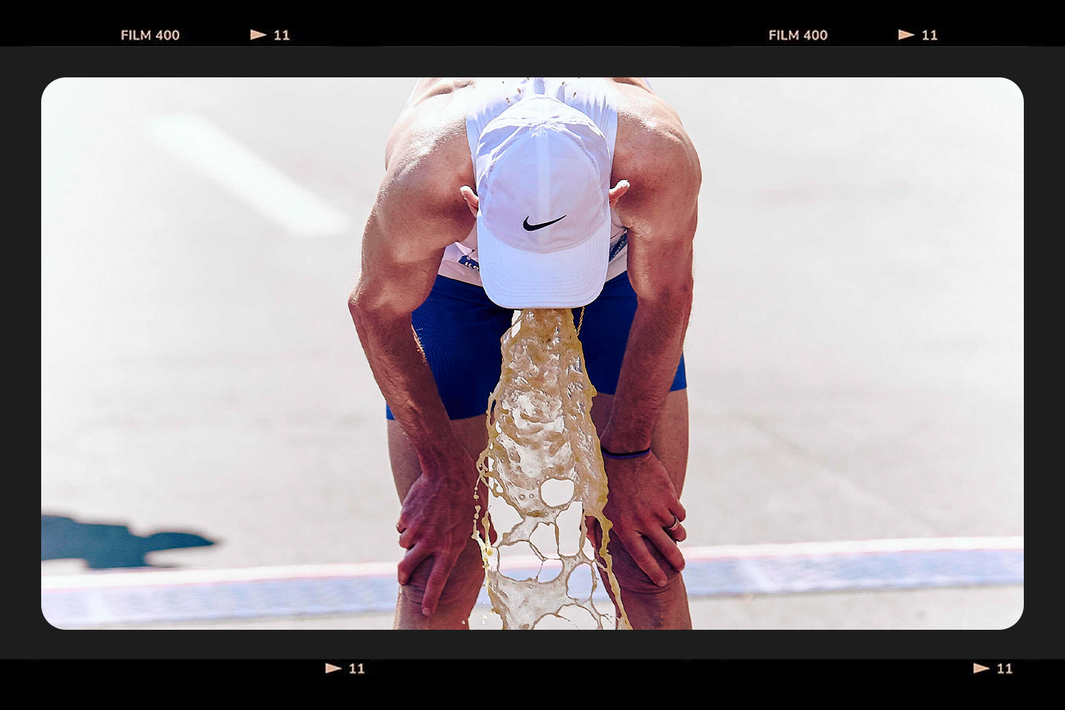 A runner puking at the end of a race.